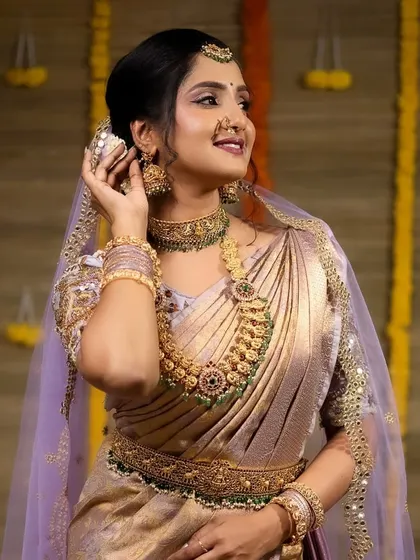 A gorgeous series of a model in a light purple saree, wearing our kemp stone bridal set. These photos show the jewellery from various angles, highlighting its beauty.