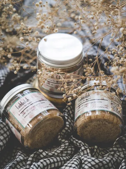 Jars of my 'Gulal' body polisher, ready for a self-care session. Using a natural exfoliator like this once or twice a week is a wonderful ritual for maintaining smooth, radiant skin.