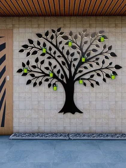 We designed this "Tree of Life" wall planter as a creative way to display plants. The black metal silhouette holds small, vibrant green pots, turning a simple wall into a living art installation.
