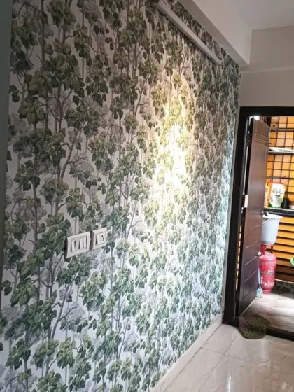 A dense forest-themed wallpaper creates a dramatic and immersive feel in this hallway. The pattern adds depth and a sense of mystery, turning a simple passageway into a feature.