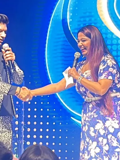 A handshake with Shaan, marking a successful collaboration on stage. These moments highlight the professional and positive relationships I build with the artists I work with.