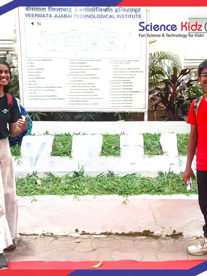 Two of our students standing proudly at the entrance of VJTI before the Technovanza event. They are ready and excited to present the projects they've worked so hard on.