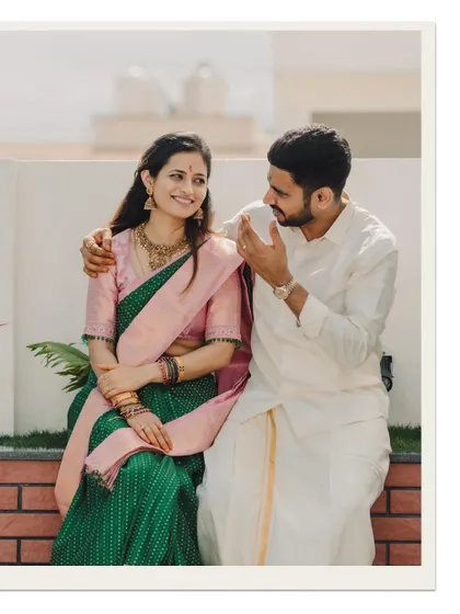 A candid moment of conversation between the couple, capturing their natural interaction and bond.