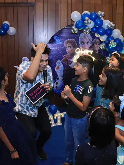 A fun, interactive moment with the kids at a Frozen-themed birthday party.