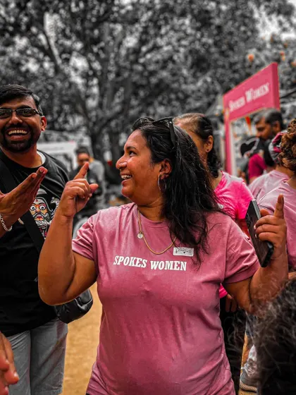 Pure excitement and happiness from a member enjoying the vibrant energy of the Garage Sale.