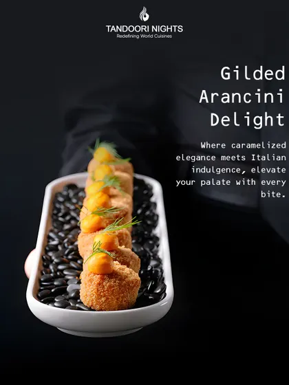 Our Gilded Arancini Delight is where Italian indulgence meets caramelized elegance. These crispy risotto balls are perfectly fried and topped, offering a sophisticated bite-sized appetizer.