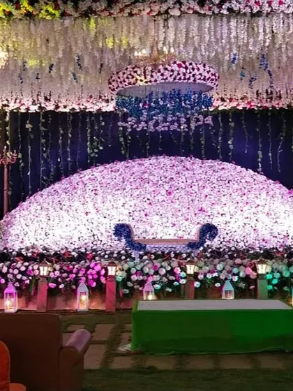 A closer view of the grand floral dome stage, showcasing the density and detail of the flower arrangement.