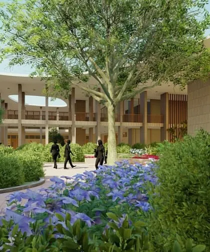 At the D.Y. Patil University Rural Health Training Centre, thoughtfully designed courtyards are central to the building's layout. These green spaces enhance airflow, invite natural light, and cultivate a calming atmosphere that supports patient recovery.