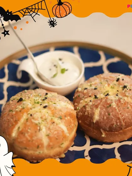 Our cheesy garlic buns, served with a creamy dip, are the perfect shareable snack.
