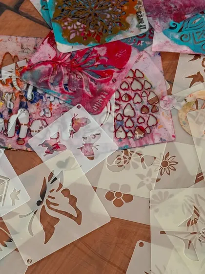 For this kids' party, we did stencil art on tote bags. It's a fun, less-messy way for kids to get creative and make their own custom party favors.