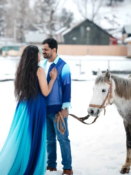 Your love story deserves an epic setting. This ombre blue gown stands out beautifully against the snow, showing how my rental gowns can travel with you to create magic anywhere.