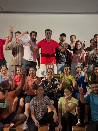 A fantastic group photo with all the participants after an energetic corporate dance event.