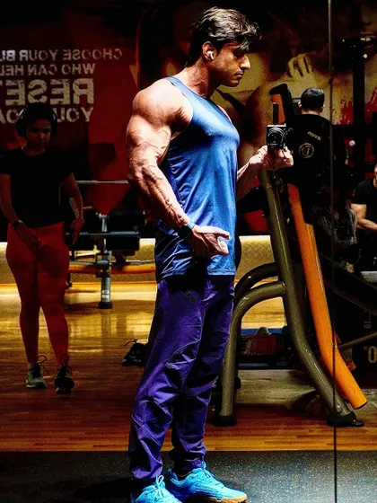 A side pose in the gym. Victory is just around the corner for those who stay resilient and never quit.