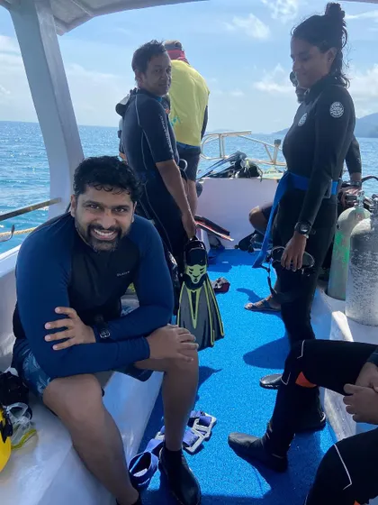 A happy diver on the boat in the Andamans. The diving here is challenging but incredibly rewarding.