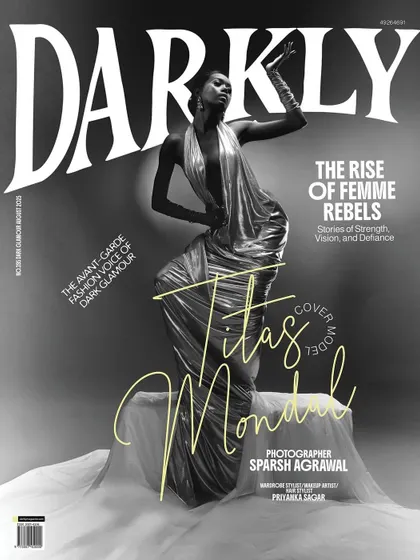 Seeing my work on the cover of Darkly Art Magazine was a defining moment. This project was about capturing the spirit of a "femme rebel" through dramatic posing, a liquid-metal gown, and a makeup look that is both powerful and graceful.