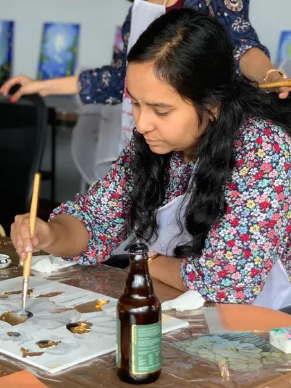 Another guest enjoying our gold leaf workshop. The combination of paint and gold creates a beautiful, textured effect.