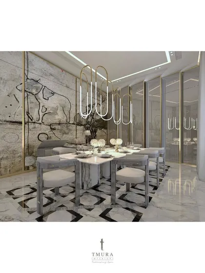 The dining room features chairs with a unique geometric design and a custom wall mural, creating a space that feels like a private art gallery.