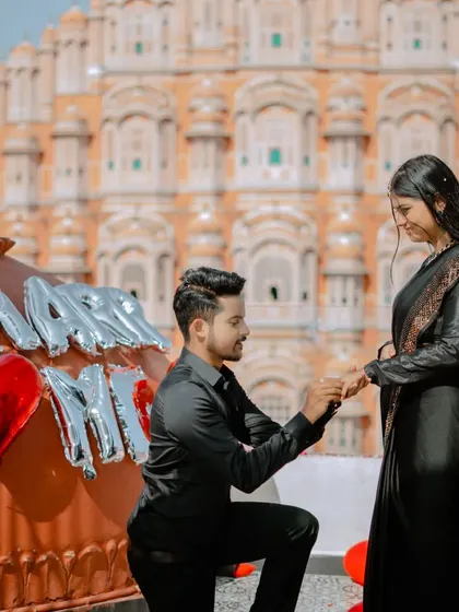 A surprise proposal setup in front of the magnificent Hawa Mahal. I can help you plan and capture these special moments, creating memories that will last a lifetime.