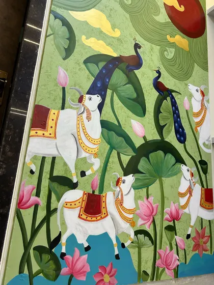 Another angle of the completed Pichwai wall art. The composition is designed to draw the eye upwards towards the sun, creating a sense of wonder and devotion.