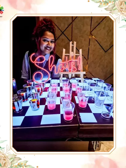 Our incredible mixologist Gisela, ready to serve at a wedding in Hyderabad. Her smile and the creative shot display showcase the fun and professionalism we deliver.