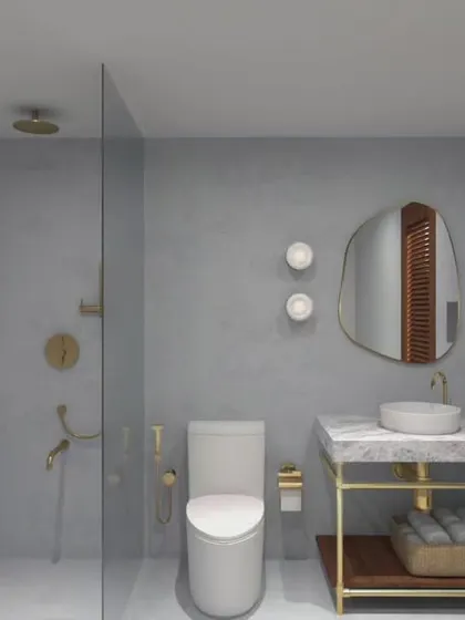 Clean, crisp, and contemporary is my anthem for many projects. This bathroom uses a simple palette of grey micro-cement walls, wood accents, and brass fixtures to create a look that is modern, warm, and timeless.