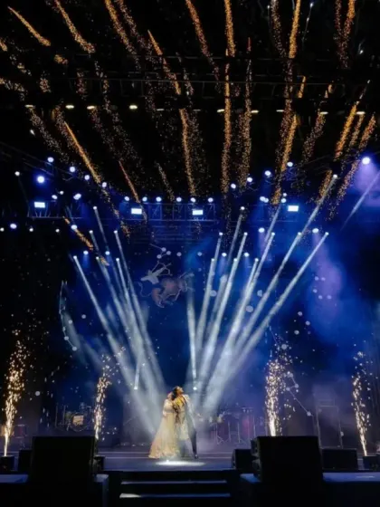 The energy of a sangeet night is electric, and we design stages to match. Here, the couple’s performance is amplified by concert-grade lighting and perfectly timed pyrotechnics, creating a truly cinematic and high-energy moment for everyone to remember.
