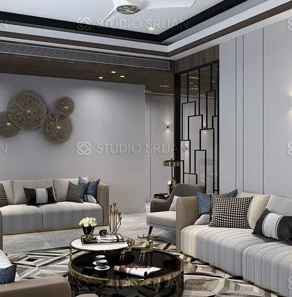 Another view of the Sushant Lok living area, highlighting the layered ceiling design and the use of metallic wall art.