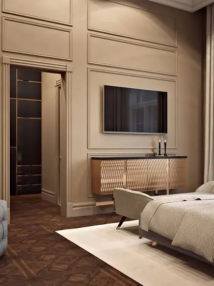 A bedroom with a hidden walk-in closet integrated seamlessly into the wall paneling, a testament to our clever storage solutions.