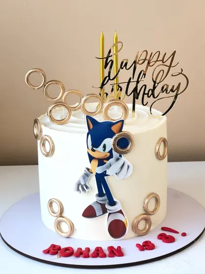 A Sonic the Hedgehog cake, complete with golden rings, for a fan of the speedy video game character.