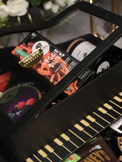 For the music lover, this piano-shaped gift box is a showstopper. It's a fun and creative way to present Diwali treats and will surely be a conversation starter.