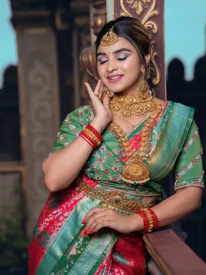 A serene and elegant pose, this shot provides a beautiful profile of the model and the jewellery.