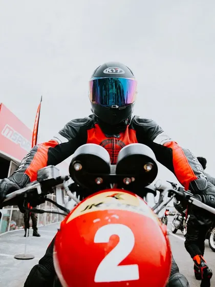 A rider's perspective, ready to launch from the pits. This moment is filled with focus and anticipation before heading out for a session of learning and skill-building.