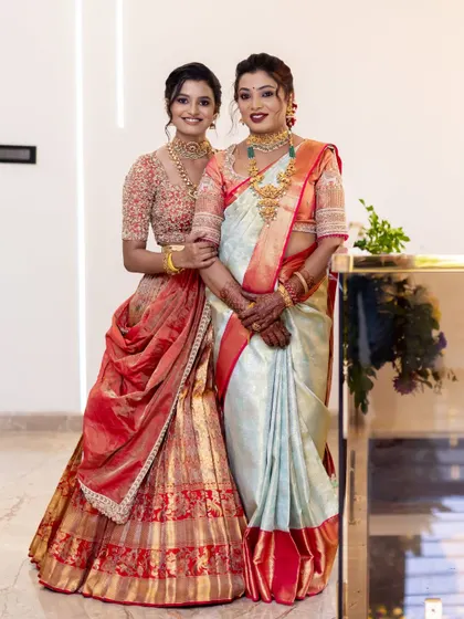 Grace in every detail for this mother-daughter duo at their housewarming ceremony. I created soft, elegant looks for both, ensuring they looked coordinated and beautiful.
