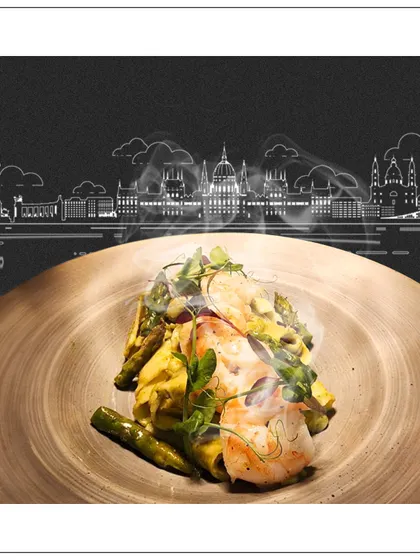A taste of Budapest. This dish of succulent prawns and asparagus was part of the bespoke menu we created for a destination event, blending local ingredients with our global culinary style.