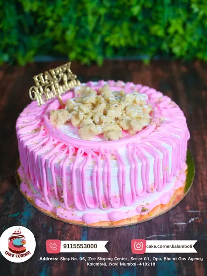 A pretty pink drip cake topped with sweet crumbles. The simple design and "Happy Birthday" topper make it a cheerful and delicious choice.