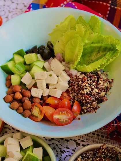Another perspective of the High Protein Salad Bowl, showing the beautiful colors of the fresh vegetables and protein sources before they are tossed together.