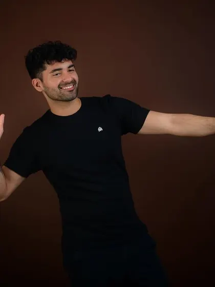 A playful and carefree pose. For actors, showing a fun and energetic side is just as important as showing a serious one.