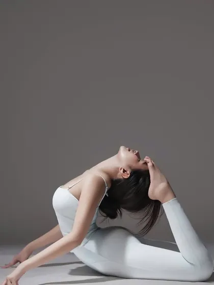 A closer look at the alignment in Purna Bhujangasana. Notice the deep arch of the spine and the open chest, which are hallmarks of this advanced backbend. We teach the progressive steps to approach such asanas safely.