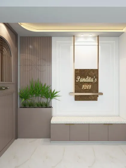 Elegant first impressions start at the doorstep. This design for the Pandita family features a custom safety door with arched detailing, a floating nameplate, and a bench with built-in shoe storage.