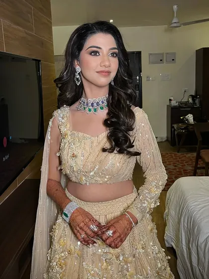 Dreamy sangeet glam for this beautiful bride. I focused on creating a flawless, dewy base and a soft brown smokey eye to complement her elegant champagne gold lehenga.