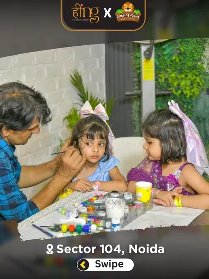 A young guest gets her face painted during a Barbie-themed party. Face painting is a creative and fun activity that lets kids transform into their favorite characters.