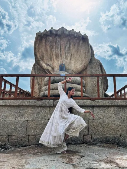 My dance amidst the stone structures and open sky at Lepakshi creates a unique blend of art and culture that fills me with joy.