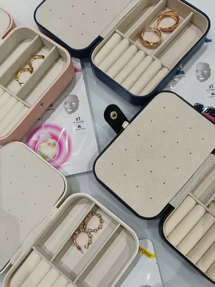 Simple gifts that mean the most. This Rakhi curation includes portable jewelry organizer boxes and face masks, perfect as thoughtful and useful return gifts for sisters.