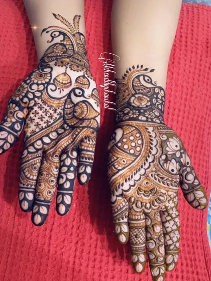 A beautiful design combining peacocks, jhumkas, and floral patterns for a rich, festive look.