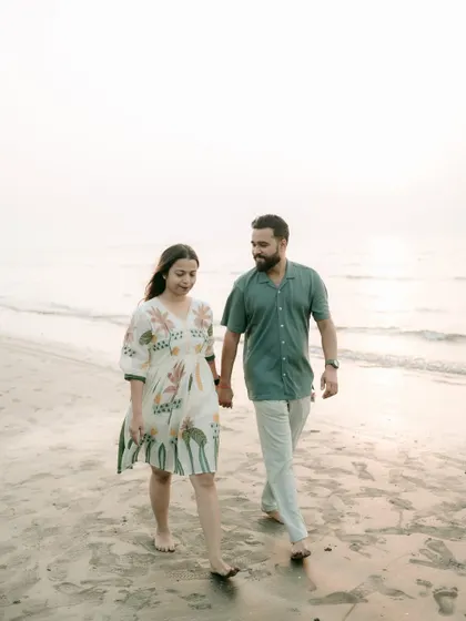 A simple, candid walk along the shoreline. These unposed moments often result in the most authentic and beautiful pre-wedding photographs.