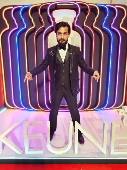At the photo booth for Keune's 100-year journey celebration in Delhi, where I performed a live sand art show.