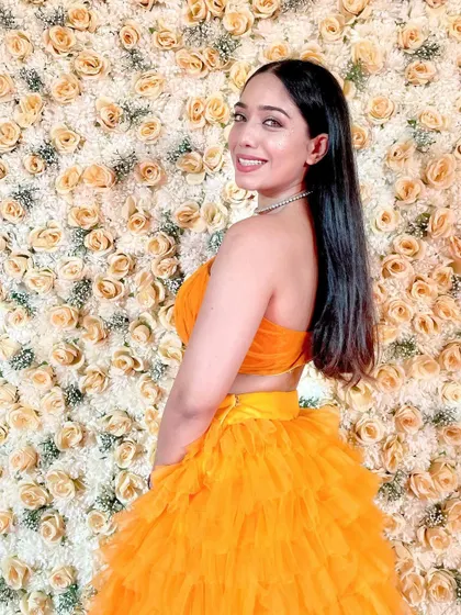 Blossom. A bright and happy picture in my orange ruffled lehenga, perfect for a sunny Haldi function.