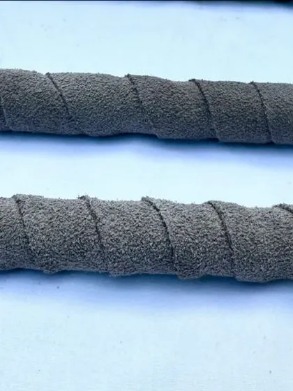 A close-up of the leather grip handle on my heeling stick. I chose this material because it provides a firm, comfortable grip for the handler in any weather condition.