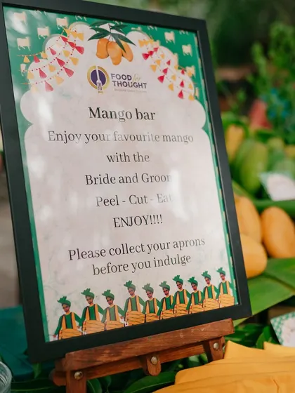 A unique 'Mango Bar' where guests could enjoy fresh mangoes. We love creating personalized food stations that reflect the couple's favorites or the season.