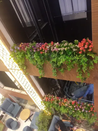 Another angle of the beautiful floral and ivy arrangements on the mall's internal balconies.